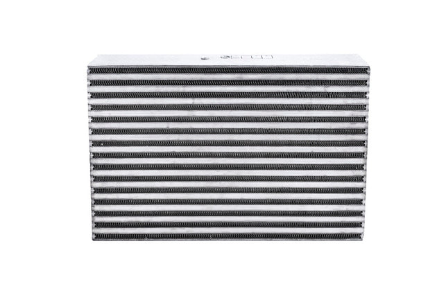 Garrett intercooler CAC for 750 HP engine, 18x12.1x3 inch aluminum air cooler with fins and inlet/outlet ports in a close-up view.