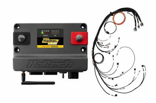 Haltech NEXUS Rebel JZ cable throttle and EV1 injectors installed in a vehicle engine for manual transmission tuning.