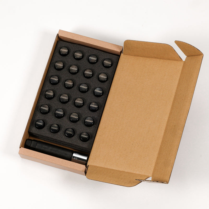 Black Rays M12x1.25 lug nuts set with 5-hole design, including 16 nuts, 4 lock nuts, an adapter, and a lock nut key.
