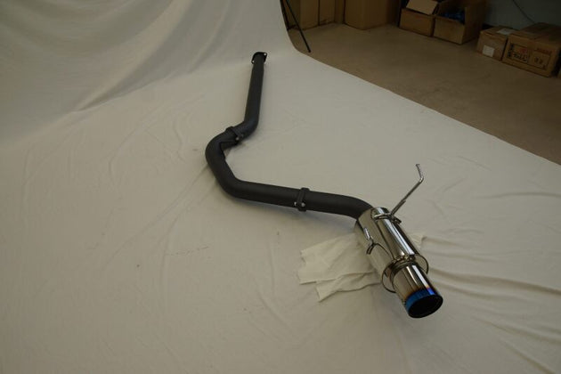 HKS Hi-Power Muffler VBH FA24 catback exhaust system installed on a vehicle, showcasing the polished stainless steel finish.