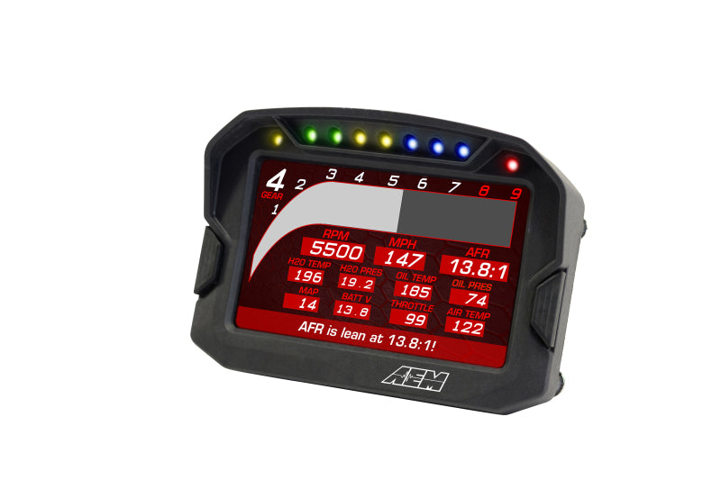 AEM CD-5LG carbon logging digital dash display with internal 10Hz GPS and antenna, showing gauges and data readouts.