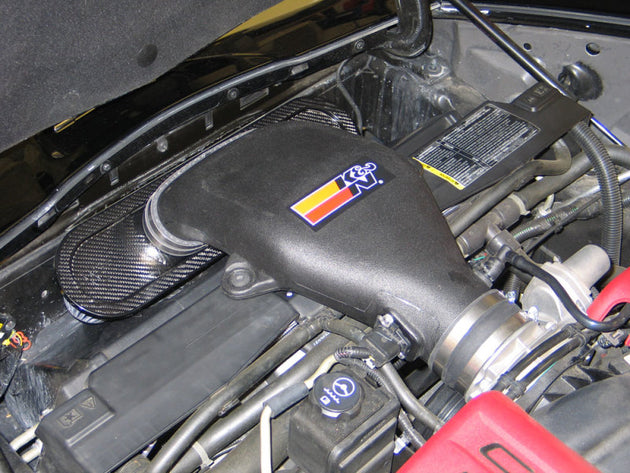 K&N Engineering cold air intake for 2006-2009 Chevy Corvette Z06 V8 7.0L engine, showing the intake tube and filter.