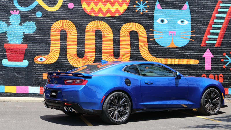 Polished CORSA Performance axle-back exhaust for Chevrolet Camaro SS 2017-2024 with 6.2L V8 engine, featuring dual exits and chrome finish.
