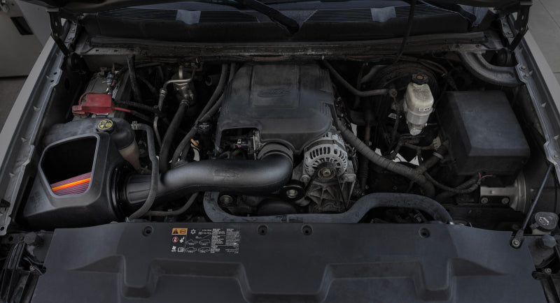K&N Engineering cold air intake system for 2009-2012 V8 GM 1500 trucks, featuring high-performance air filter and intake tubing.