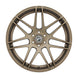 Forgestar X14 22x10 satin bronze cast wheel with 6x135 bolt pattern, ET30 offset, 6.7-inch backspacing, shown from side angle.