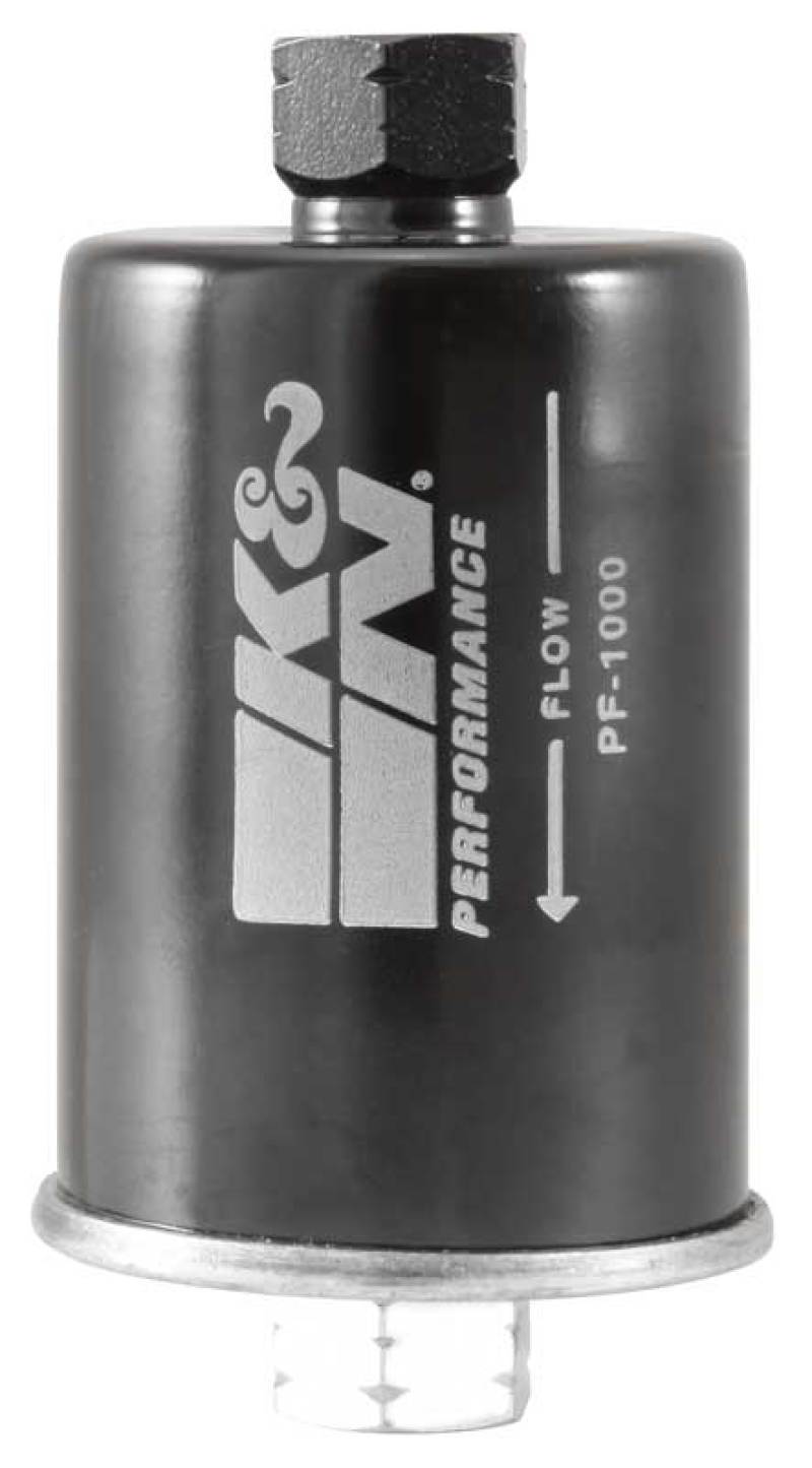 K&N Engineering cellulose media fuel filter with 2.125-inch diameter and 4.281-inch length, showing filter media and metal end caps.