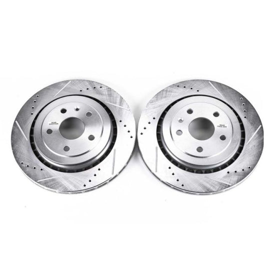 Pair of PowerStop 16-18 Cadillac ATS rear drilled and slotted brake rotors, high-performance brake components with drilled and slotted design.