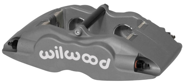 Wilwood Forged Superlite brake caliper with 1.62-inch pistons and 1.10-inch disc for high-performance braking.