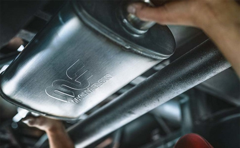 MagnaFlow muffler with 3.5-inch diameter and 18-inch length, featuring dual 2.25-inch inlet and outlet pipes for exhaust systems.