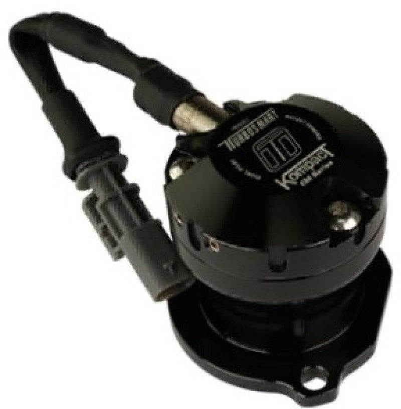 Turbosmart Kompact EM BOV VR7 plumb back blow off valve installed on a turbocharged engine system.