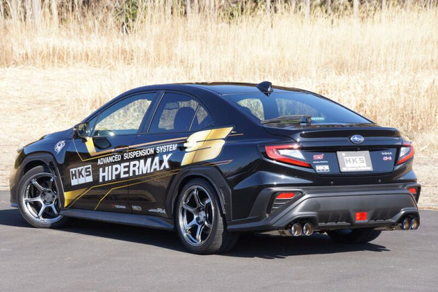HKS 2021 Subaru WRX Legamax Sport catback exhaust system installed, showcasing polished stainless steel tips and dual exhaust outlets.