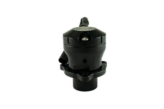 Turbosmart EM Kompact BOV Plumb Back VR18 blow-off valve installed on a vehicle engine for enhanced turbo performance.