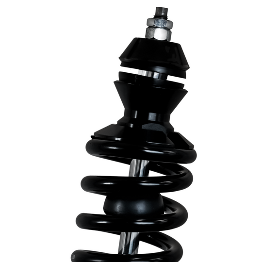 QA1 Chevrolet Corvette coilovers with 2.25-inch diameter aluminum front coil-over kit, showcasing adjustable shocks and mounting hardware.