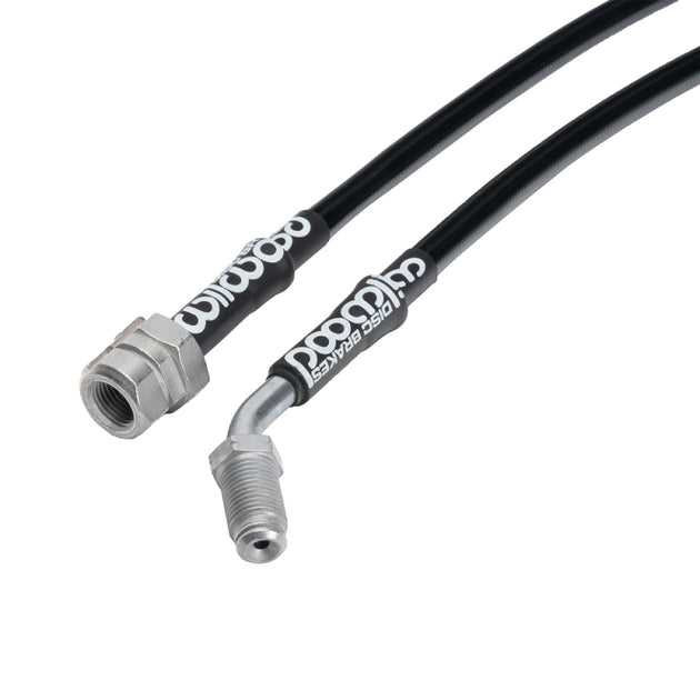 Wilwood front brake line kit for 2004 Volkswagen R32, showing durable flexible brake lines installed on the vehicle's front brake system.