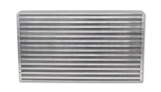 Vibrant intercooler core measuring 18x12x6 inches, with bright fins and metal end tanks for high-performance turbocharged engines.