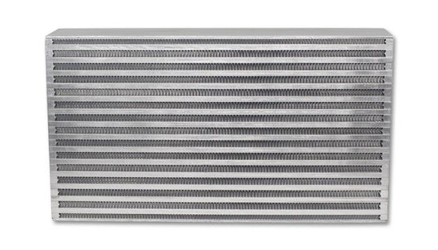 Vibrant intercooler core measuring 18x12x6 inches, with bright fins and metal end tanks for high-performance turbocharged engines.