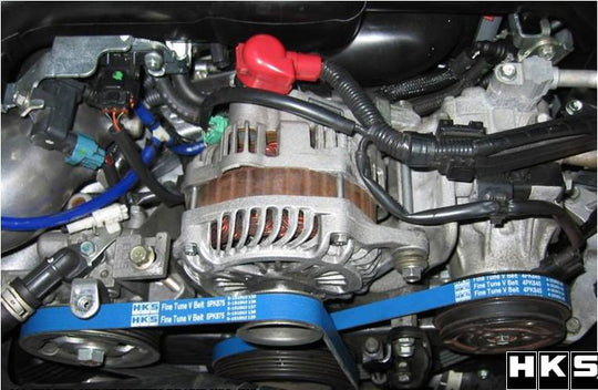 HKS Fine Tune V-Belt 6PK1930 for timing and accessory drive, showing the black rubber belt with HKS branding and pulley attachment points.
