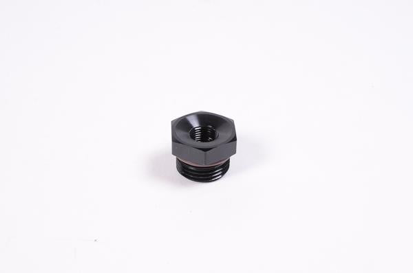 Radium Engineering 8AN ORB to 1/8NPT female adapter fitting in black anodized aluminum showing detailed close-up.