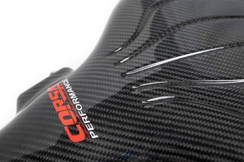 CORSA Performance cold air intake for Chevrolet Corvette C6 Z06 7.0L V8 engine, showing the sleek black intake system and filter.