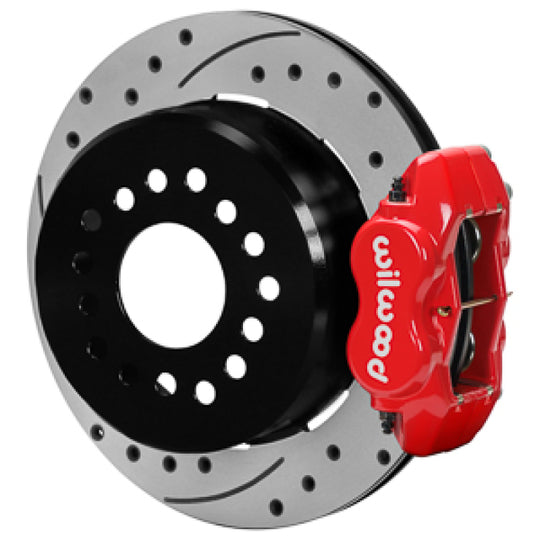 Wilwood Chevy Monte Carlo forged 4-piston DynaPro red brake caliper with 12.19-inch D&S rotor in a big brake kit setup.