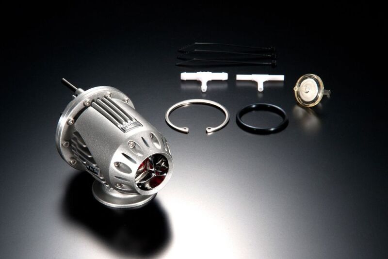 HKS Super SQV4 FL5 blow off valve installed on a vehicle, showcasing the HKS brand and sleek design.