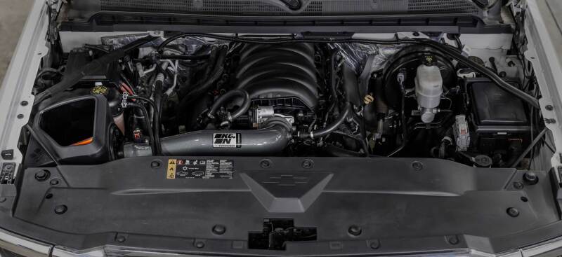 K&N Chevy/GMC 1500 V8 5.3L/6.2L NextGen aluminum cold air intake system installed in a vehicle engine bay