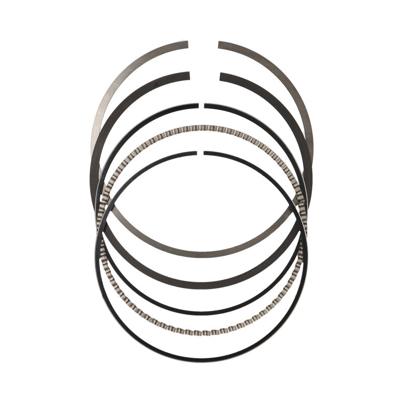 JE Pistons piston ring set with multiple rings, labeled 99.5 and 79, featuring high-performance engine components and precise fit.