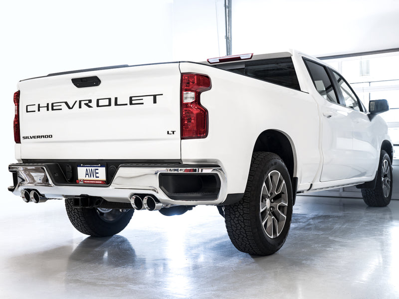 AWE Tuning 4th Gen GM 1500 6.2L catback exhaust with split rear exit and quad chrome tips, featuring bumper cutouts.
