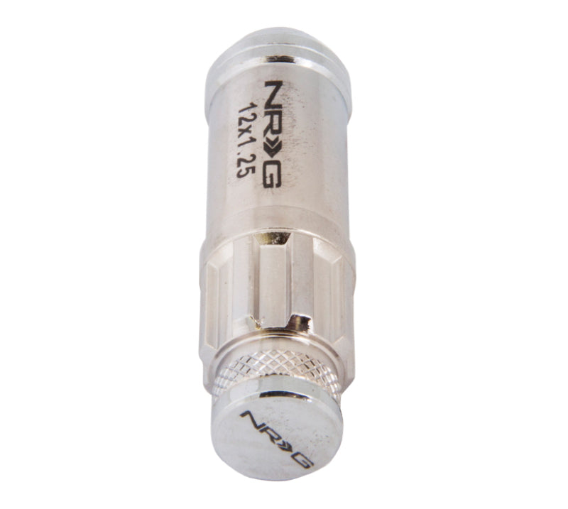 NRG 700 Series M12 x 1.25 steel lug nut set with dust caps, locks, and lock socket in silver for automotive wheels.