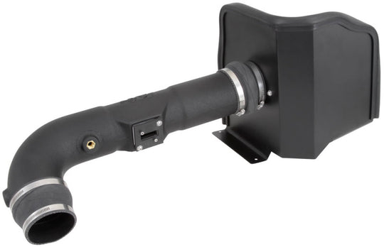 K&N 63 Series AirCharger cold air intake kit installed in a Chevy Silverado 1500 or GMC Sierra 1500 V8 engine, showcasing the air intake.