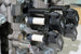 HKS Super Fire Racing Coil Pro FD3S RX-7 stock replacement ignition coil installed in a Mazda RX-7 engine bay
