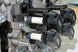 HKS Super Fire Racing Coil Pro FD3S RX-7 stock replacement ignition coil installed in a Mazda RX-7 engine bay