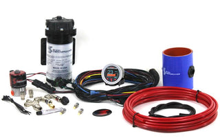Snow Performance Stage 2 Boost Cooler turbo diesel water meth kit with hoses, injection nozzles, and control module for enhanced engine cooling.