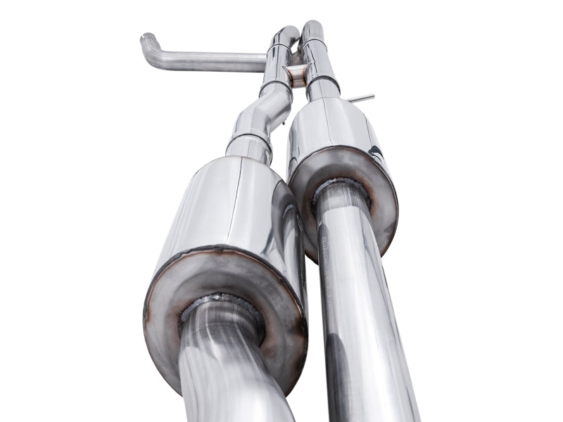AWE Tuning 4th Gen GM 1500 6.2L catback exhaust with split rear exit and quad chrome tips on a pickup truck.