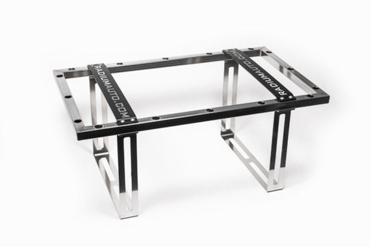 Radium Engineering 14-gallon fuel cell weld-in cage for fuel tanks, showing the durable metal cage and fittings for installation.