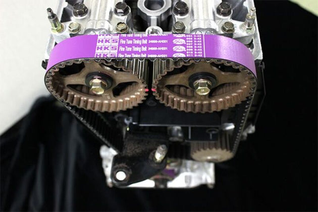 HKS fine tune timing belt for B16A engine, high-performance accessory, showing the black rubber belt with metal teeth.