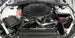 K&N Engineering silver Typhoon short ram intake for 2016-2017 Chevy Camaro 3.6L cold air intake system showing the intake tube and filter