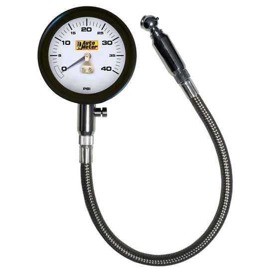 AutoMeter NASCAR Performance 40 PSI tire pressure gauge showing a close-up of the dial and needle in a black and silver design.