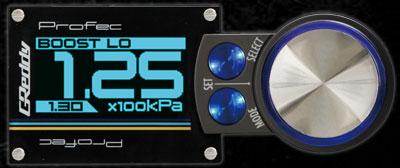 GReddy PRofec electronic boost controller with digital display and control knobs for turbocharged vehicles.