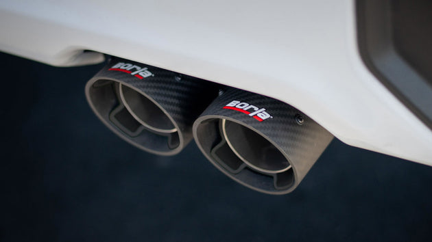 Borla 2024 Chevy Silverado 1500 6.2L V8 ATAK catback exhaust with black anodized CF finish, shown with exhaust tips and piping.