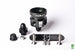 Radium Engineering fuel pressure regulator body with metal fittings and adjustment knob, designed for automotive fuel systems.