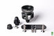 Radium Engineering fuel pressure regulator body with metal fittings and adjustment knob, designed for automotive fuel systems.