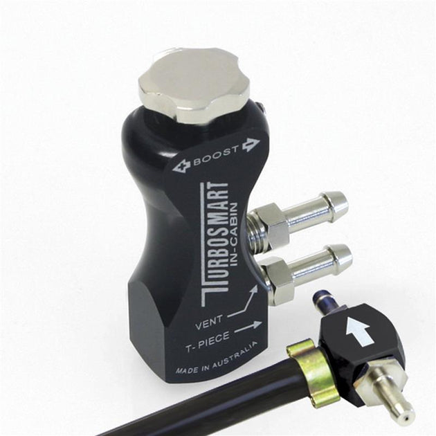 Turbosmart GBCV In Cabin Black boost controller with black control knob and gauge for precise turbo boost adjustment.