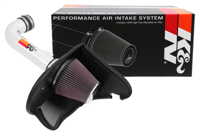K&N Engineering silver Typhoon short ram cold air intake installed in a 2016-2017 Chevy Camaro 3.6L engine for improved airflow.