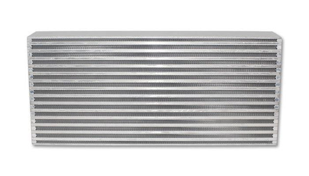 Vibrant intercooler core measuring 22x9.85x4 inches, designed for efficient air cooling in performance vehicles.