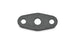Vibrant oil drain flange gasket for engine parts, showing a close-up of the bright orange gasket against a metallic background.