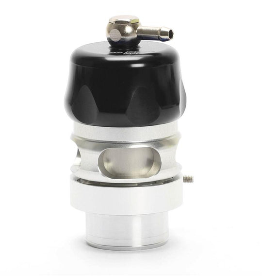 Turbosmart Vee Port Pro black blow off valve installed on a vehicle, showcasing its compact design and matte black finish.