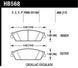 Hawk Performance OE rear brake pads for Chevy Tahoe LTZ, showing the brake pad set with metal backing plates and friction material.