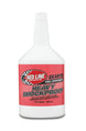 Red Line Heavy ShockProof Gear Oil quart bottle with label, designed for gear lubrication and protection in automotive applications.