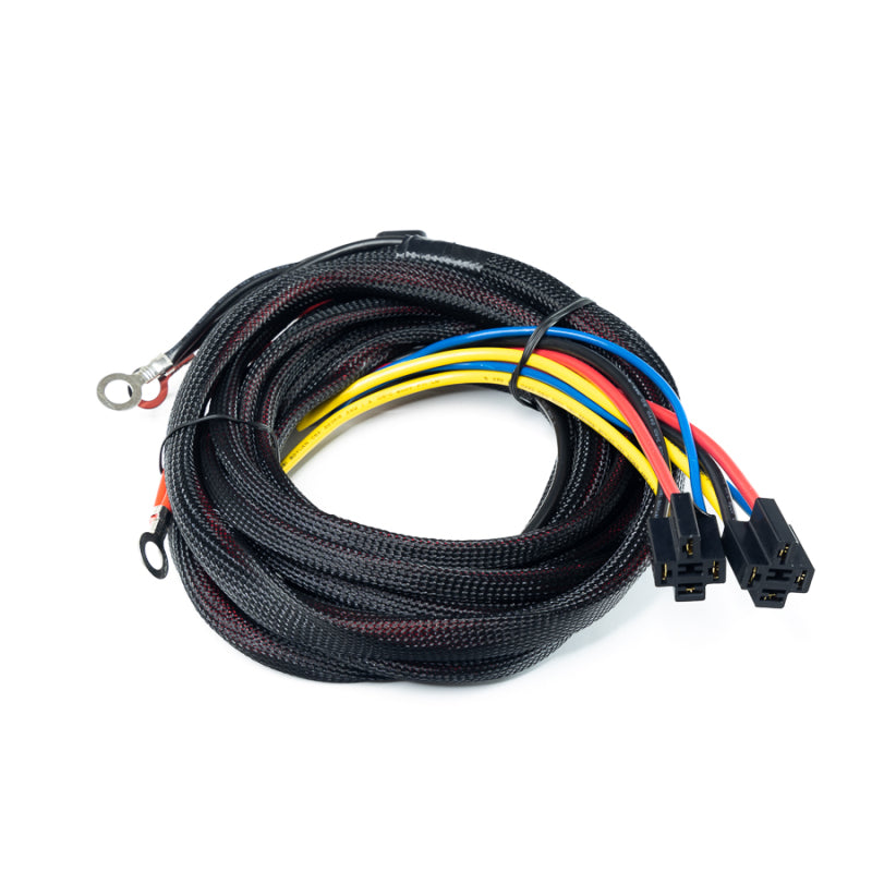 DeatschWerks dual-pump universal kit for hardwiring two fuel pumps to a vehicle battery, includes wiring and connectors.